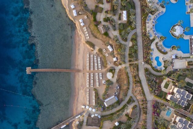 Four Seasons Sharm El Sheikh luxury beachfront resort Red Sea Sharks Bay aerial view